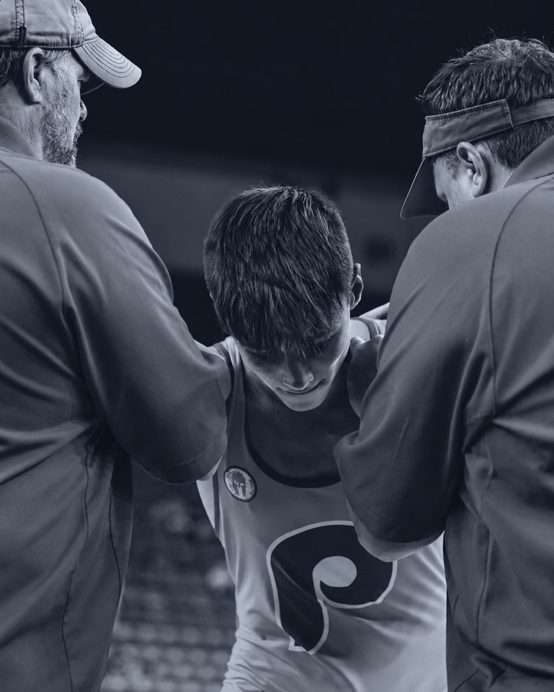 Coaches in a wrestler's corner